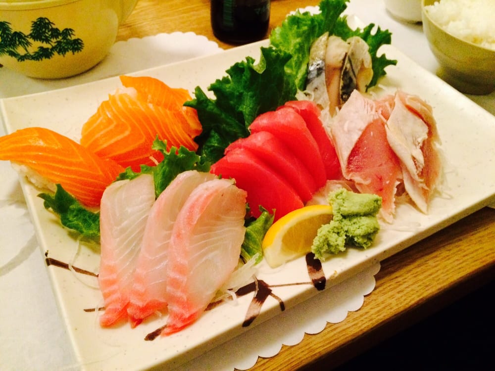 Sashimi plate of salmon, tuna, white fish and crab